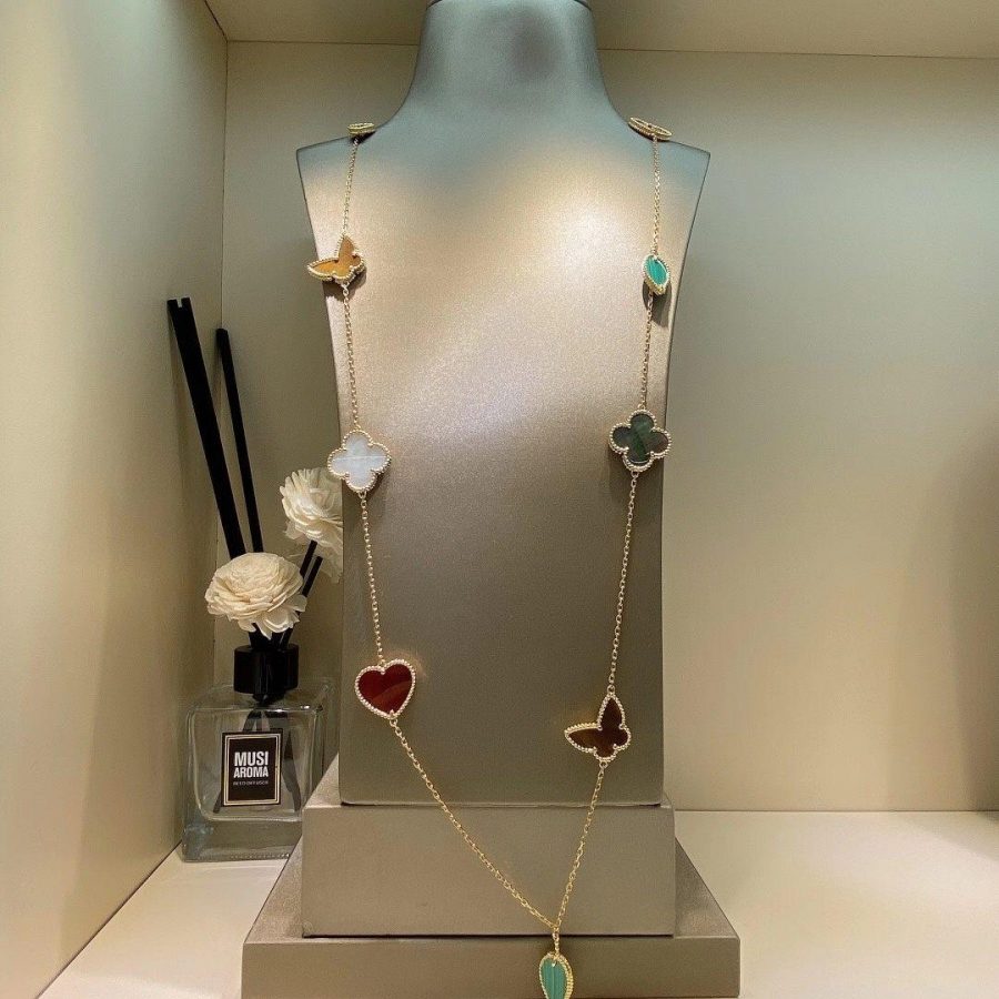 Van Cleef & Arpels Lucky Alhambra long necklace, 12 motifs Yellow gold, Carnelian, Malachite, Mother-of-pearl, Tiger Eye VCARD80100