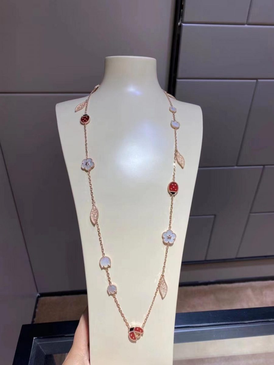 Van Cleef & Arpels Lucky Spring long necklace, 15 motifs Rose gold, Carnelian, Mother-of-pearl, Onyx VCARP7RT00