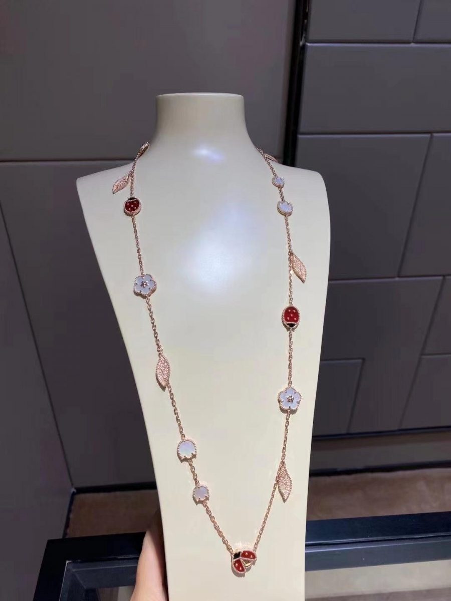 Van Cleef & Arpels Lucky Spring long necklace, 15 motifs Rose gold, Carnelian, Mother-of-pearl, Onyx VCARP7RT00