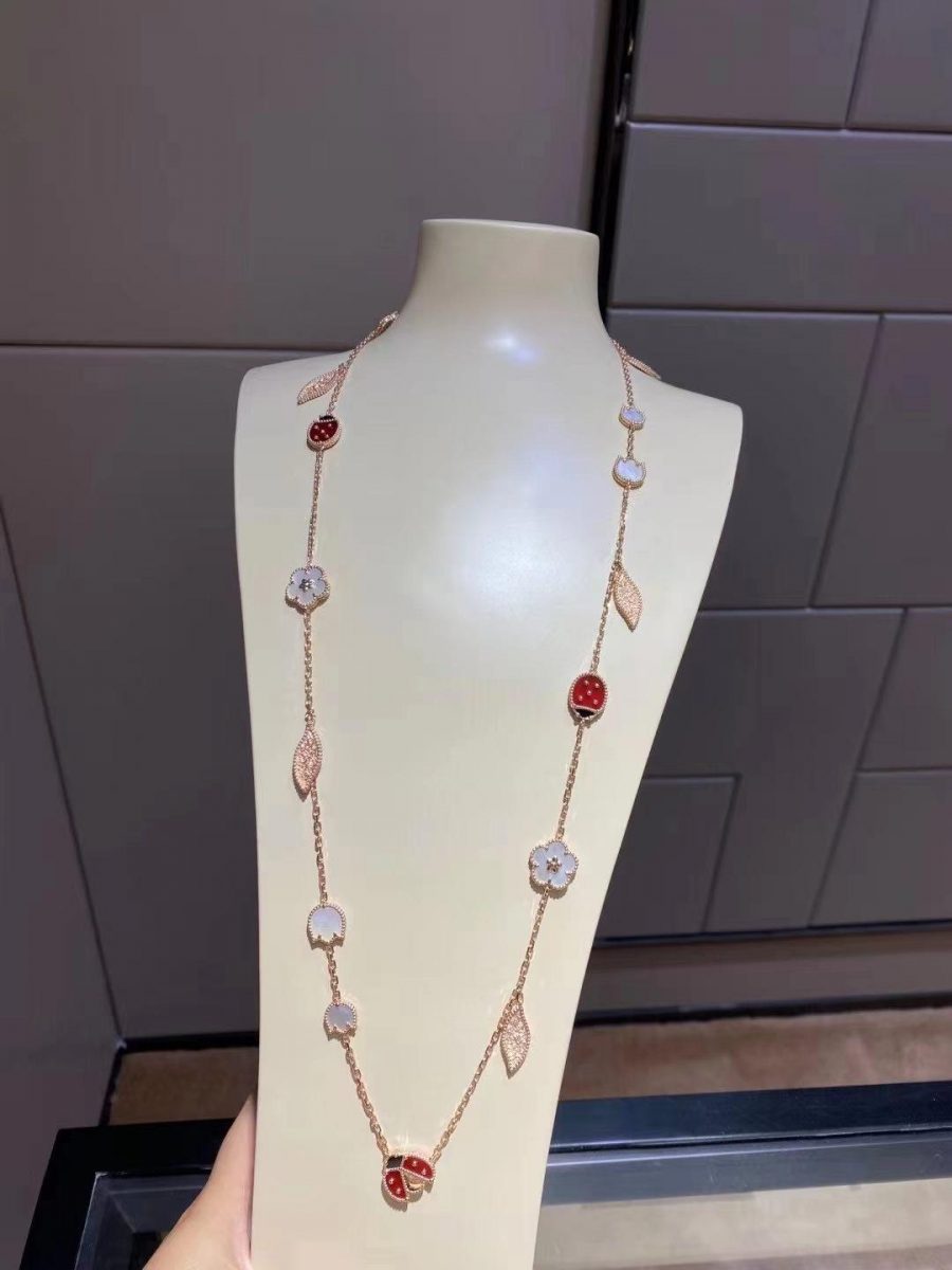 Van Cleef & Arpels Lucky Spring long necklace, 15 motifs Rose gold, Carnelian, Mother-of-pearl, Onyx VCARP7RT00