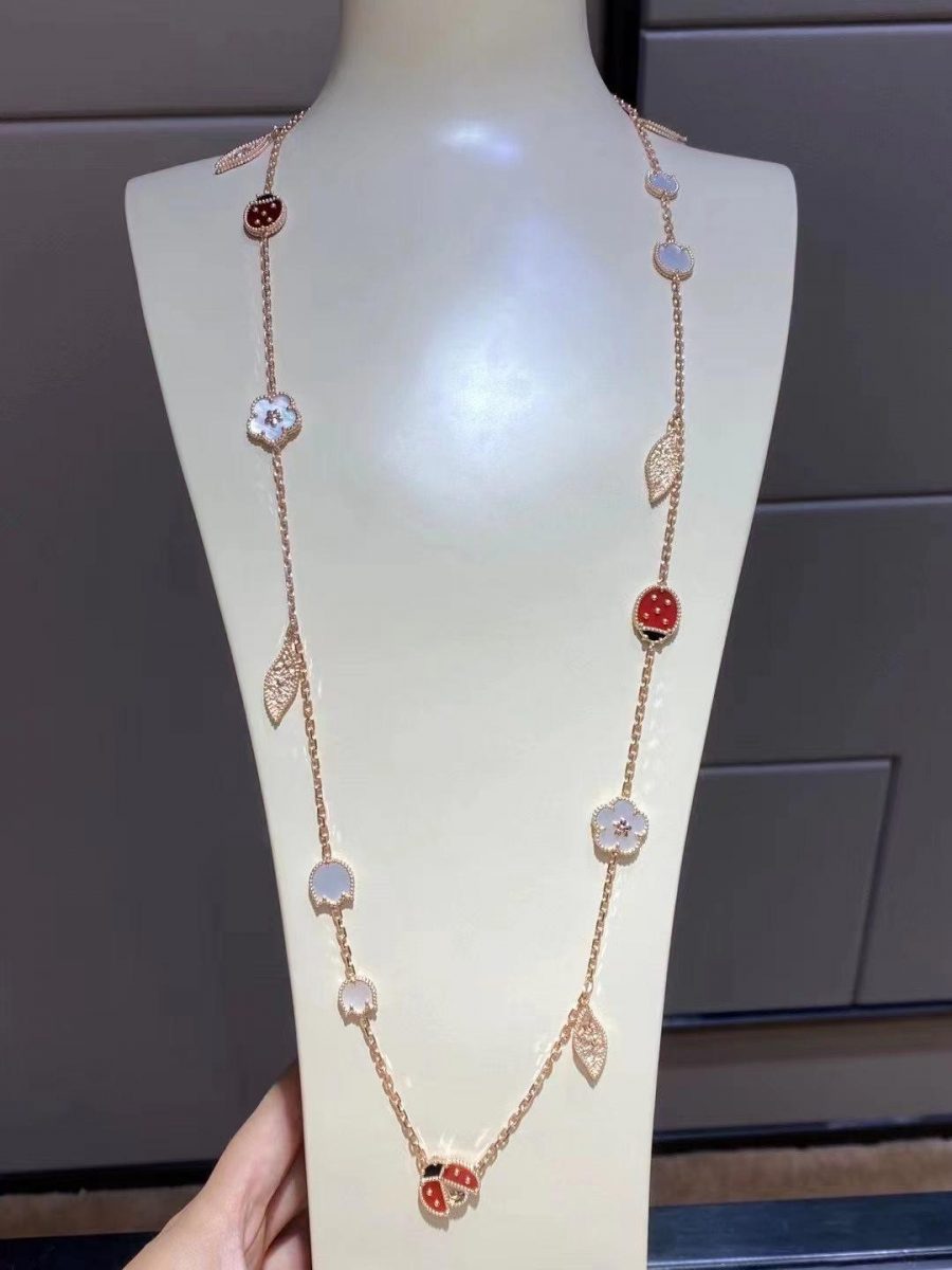 Van Cleef & Arpels Lucky Spring long necklace, 15 motifs Rose gold, Carnelian, Mother-of-pearl, Onyx VCARP7RT00