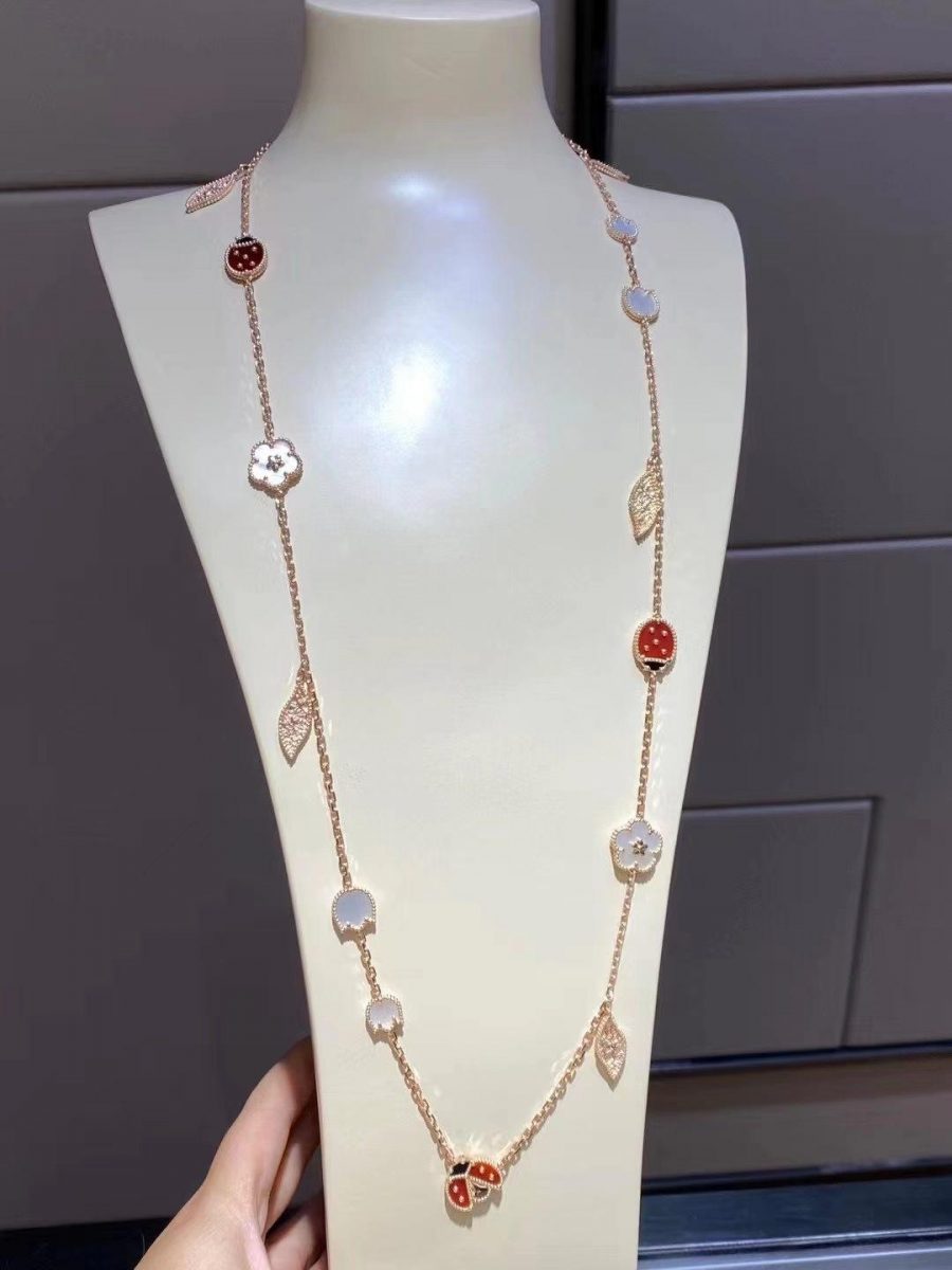 Van Cleef & Arpels Lucky Spring long necklace, 15 motifs Rose gold, Carnelian, Mother-of-pearl, Onyx VCARP7RT00