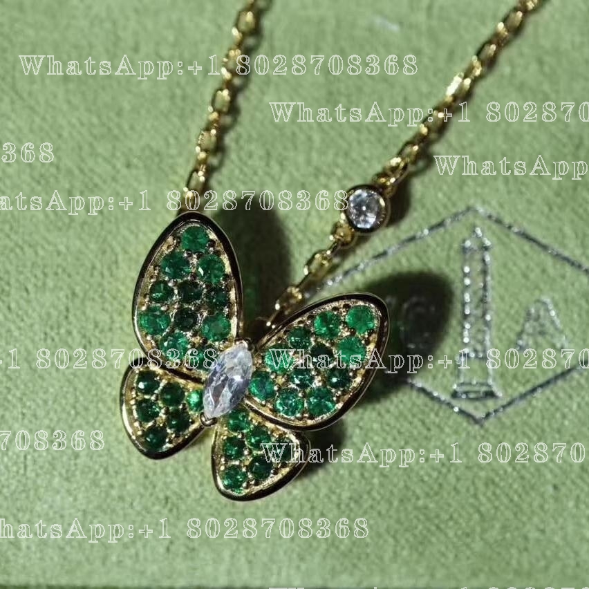 Van Cleef & Arpels Two Butterfly pendant Yellow gold, Diamond, tsavorites VCARO6W700