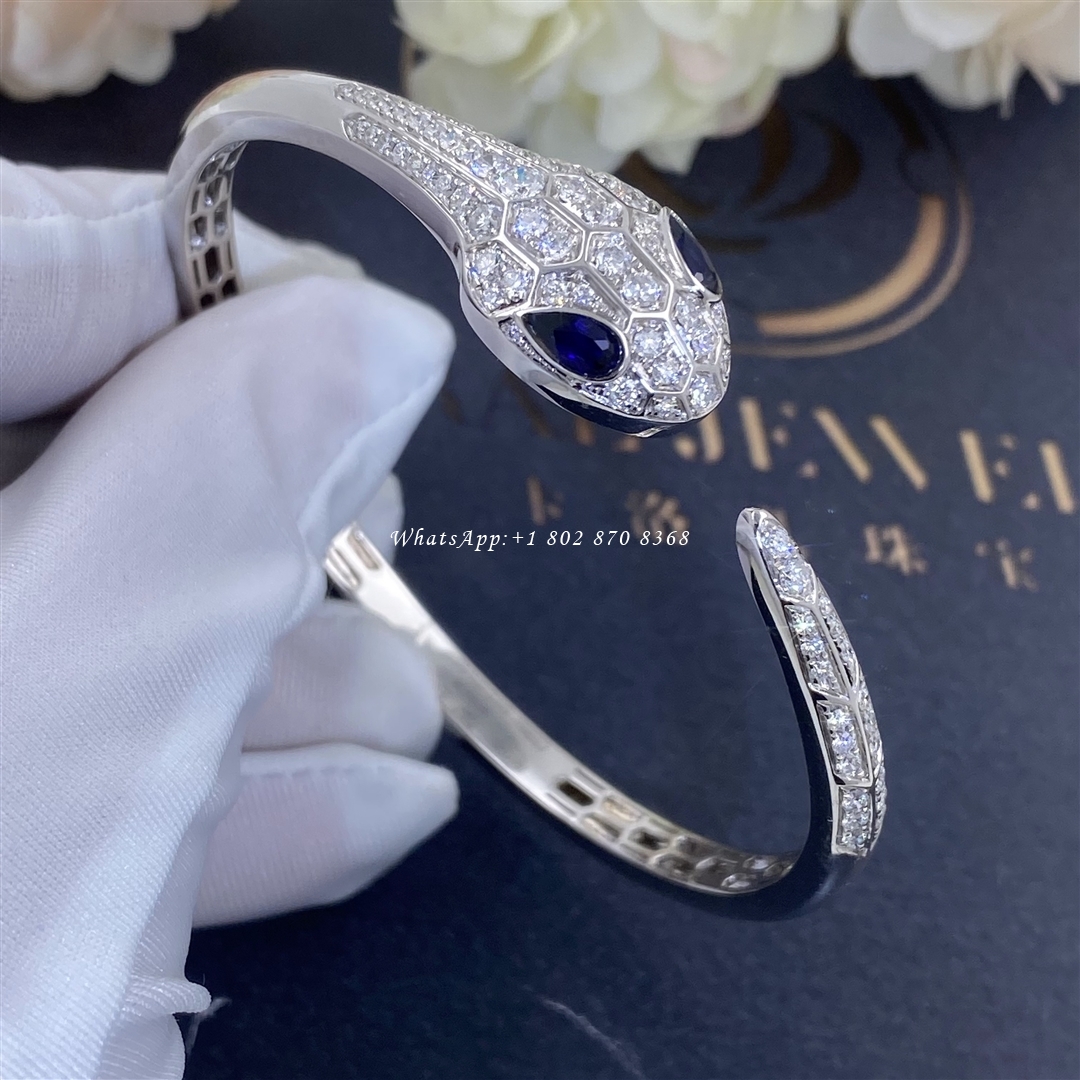 Bulgari Serpenti bangle bracelet in 18 kt white gold, set with blue sapphire eyes and pavé diamonds Ref.: 354098