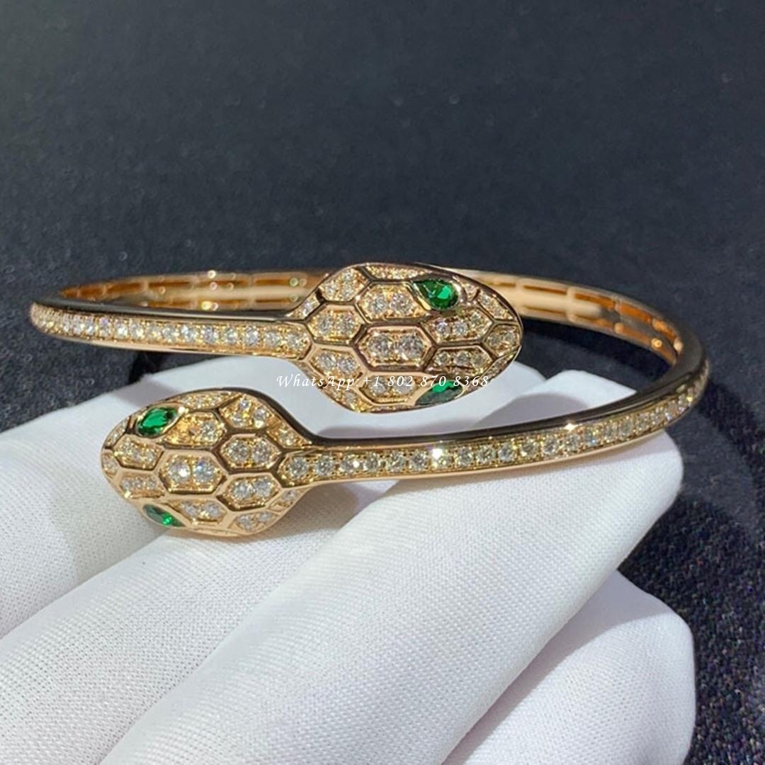 Bulgari Serpenti 18 kt yellow gold bracelet set with emerald eyes and pavé diamonds