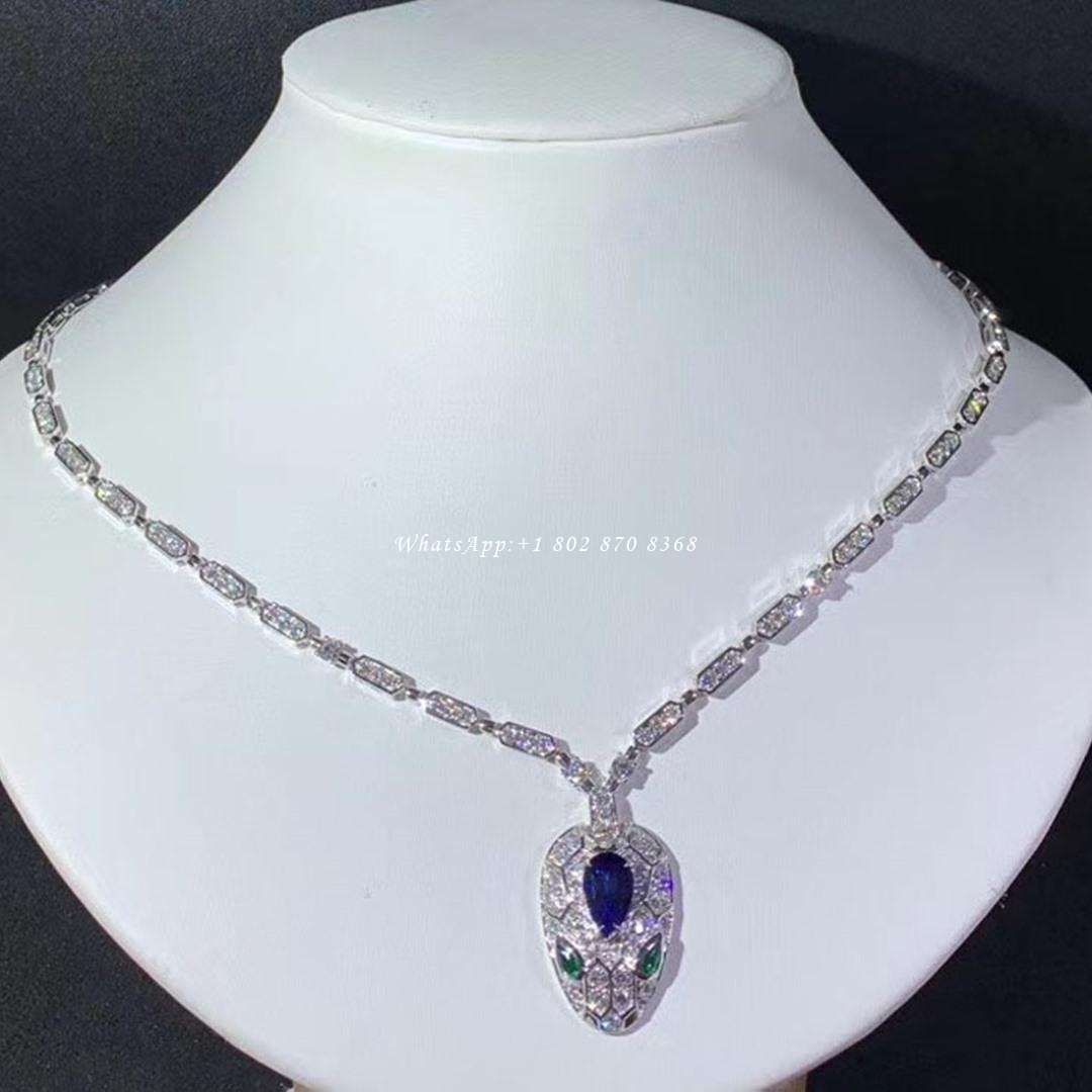 Bulgari Serpenti 18 kt white gold necklace set with a blue sapphire on the head, emerald eyes and pavé diamonds Ref.: 355354