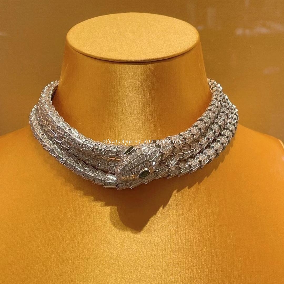 Bulgari Serpenti necklace in white gold set with two pear brilliant cut emeralds and diamond pavé necklace